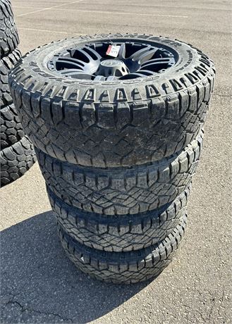 Four Truck Tires c/w Rims